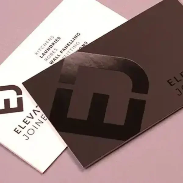Premium Spot UV business cards Dubai showing glossy logo coating on matte finish
