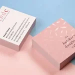 Premium Spot UV business cards in Dubai showing glossy logo coating on matte finish