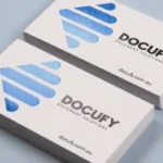 Premium Spot UV business cards in Dubai showing glossy logo coating on matte finish