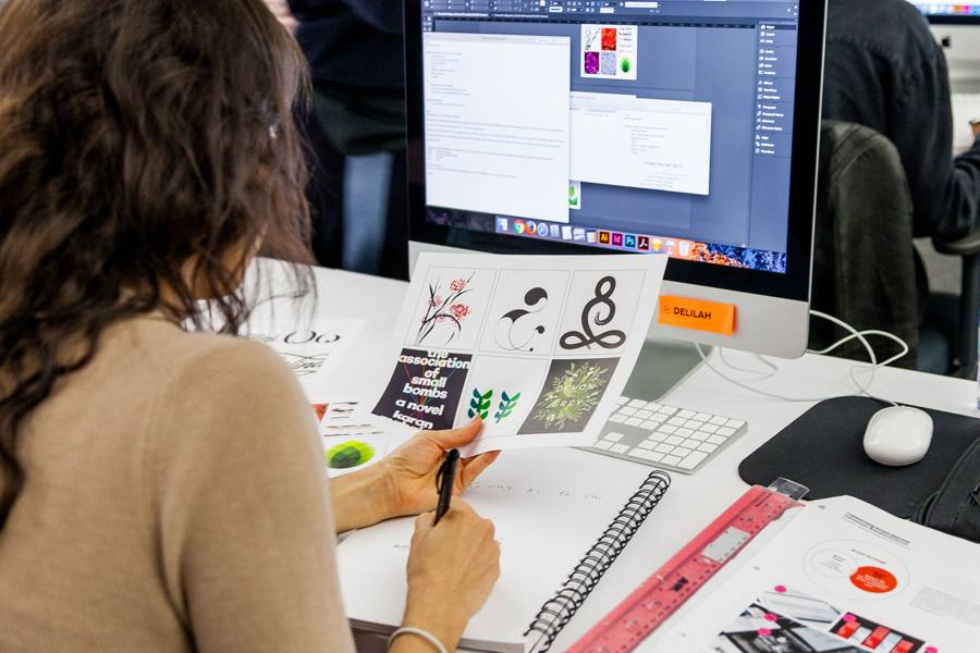Design Support Dubai: designer preparing print ready artwork files